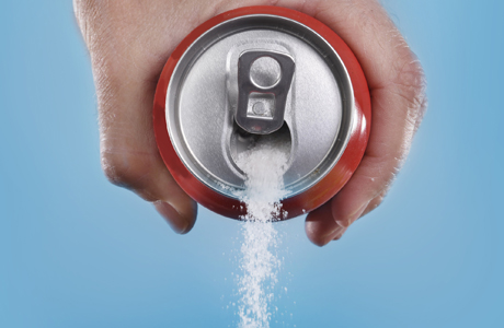 Soda can with sugar pouring out